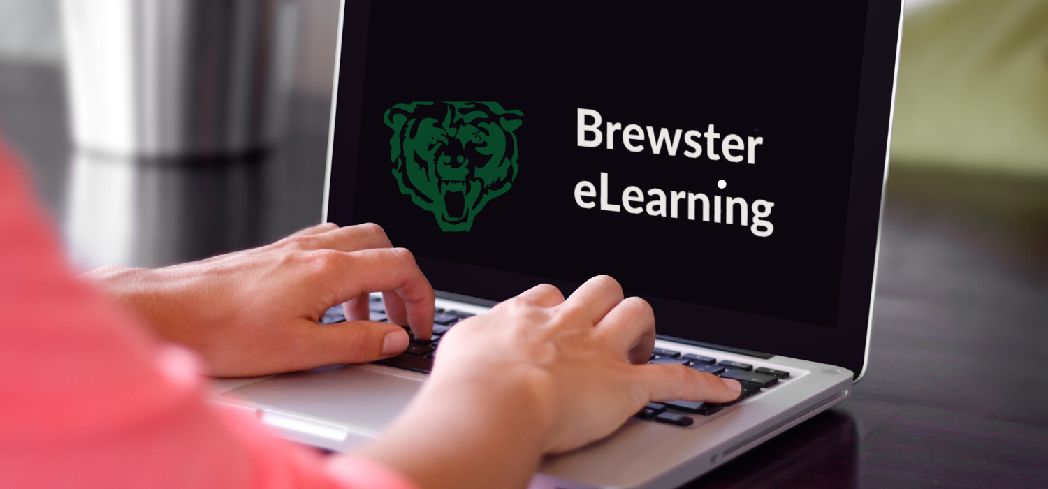 Hands typing on chromebook with the words Brewster eLearning appearing on the screen. 